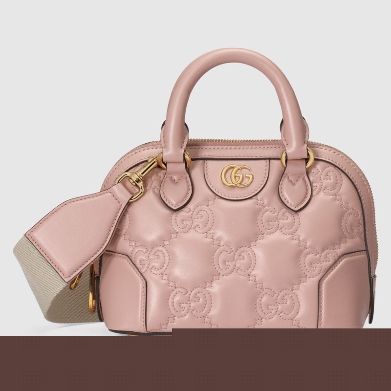 G*u*i top handle bags